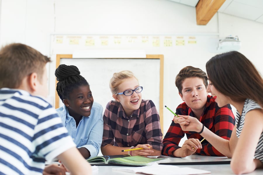 Group-Of-Teenage-Students-Collaborating-On-Project-In-Classroom-875575940_5100x3404-2